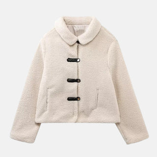 This women's cropped fleece jacket combines elegance and comfort, featuring a soft, warm material and a stylish design that is perfect for casual outings or layering during colder 0