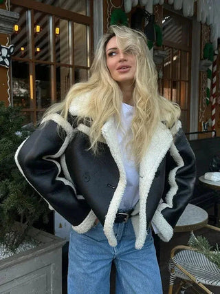 This women's teddy-style jacket in plus sizes features a cozy, warm design made from soft fleece material, perfect for stylish layering during colder months. 0