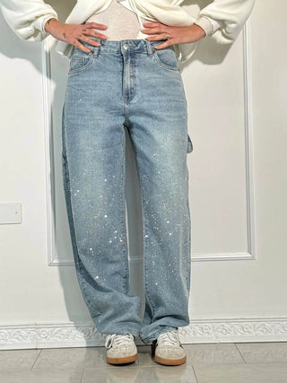 A pair of women's baggy jeans made from comfortable denim, featuring an artistic design with relaxed fit and a stylish, modern look suitable for casual wear. 1