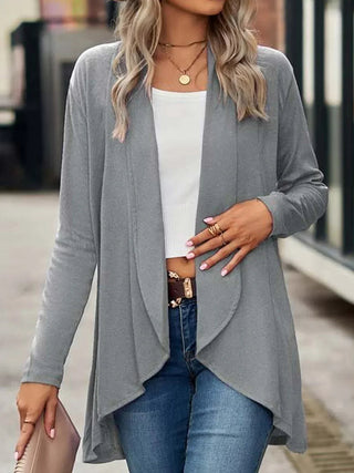This women's cardigan features a casual H-line style, made from soft and breathable material, perfect for versatile layering in cooler weather. 2