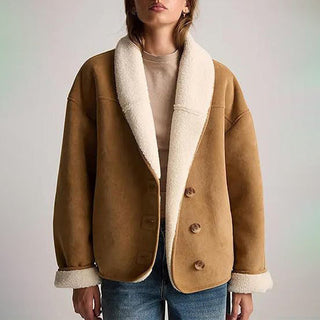 Elegant women's jacket made from soft suede, featuring a versatile design ideal for various occasions. The stylish silhouette combines sophistication with comfort, making it a perfect addition 0