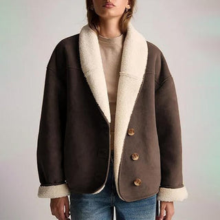 A stylish women's jacket made of soft suede material, featuring an elegant design that is versatile for various occasions, perfect for adding a chic touch to any outfit 2