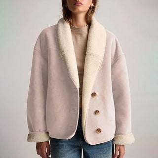 A stylish women's suede jacket featuring an elegant design, perfect for versatile outfits. The soft material adds a luxurious touch, making it suitable for both casual and 3