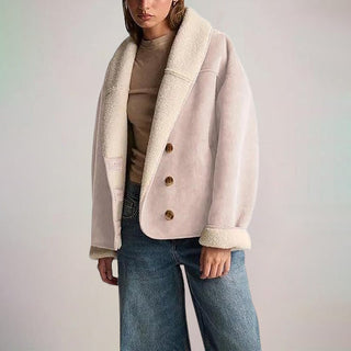 A women's suede jacket featuring an elegant and versatile design, ideal for various occasions. The soft material offers a luxurious feel while the tailored fit enhances the feminine 4