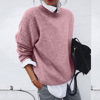 A women's sweater featuring a simple and elegant design, crafted from warm cotton for comfort. Ideal for casual or chic outfits, this pullover combines style and 1