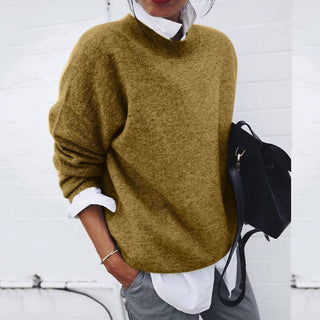 A women's pullover featuring a simple yet elegant design, crafted from warm cotton for comfort. This stylish sweater is perfect for casual wear, offering a flattering 4