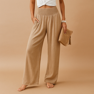 Stylish women's trousers made from soft, breathable fabric, featuring a comfortable elastic waistband, perfect for elegant autumn looks. The tailored fit complements the figure while 0