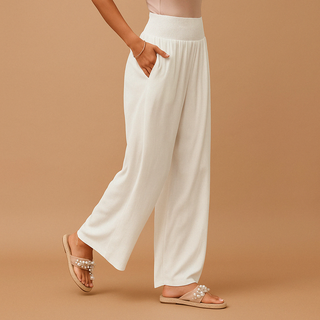 Stylish women's trousers made from soft fabric, featuring an elastic waistband for a comfortable fit. These elegant autumn pants combine sophistication with practicality, perfect for casual 1