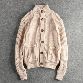 A women's knitted cardigan featuring a classic style, made from soft, breathable material, designed for comfort and versatility in any wardrobe. 3