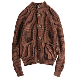 A women's cardigan in a classic style, made from soft knit material, featuring a comfortable and versatile design suitable for various occasions. 4