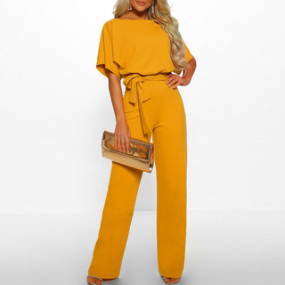 Elegant women's overall made from high-quality fabric, featuring a sophisticated cut suitable for festive occasions. Its versatile design allows for easy dressing up or down, making 5