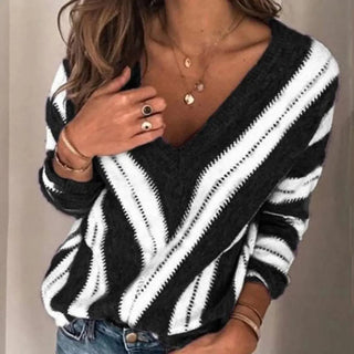 This women's pullover features a stylish V-neck design, made from elegant cotton for comfort and a chic look, perfect for both casual and semi-formal 2