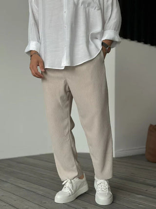 Men's casual trousers featuring a relaxed fit, crafted from comfortable fabric for versatility in style and wear. Perfect for everyday use, these pants blend comfort with 0
