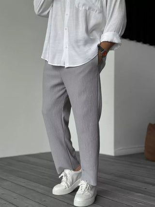 Men's casual trousers made from soft cotton, featuring a relaxed fit for comfort. These versatile pants are perfect for everyday wear, blending style and practicality effortlessly 2