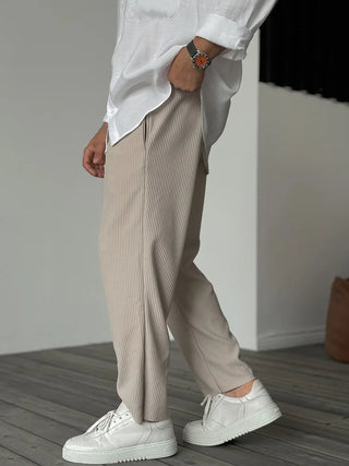 Men's casual trousers made from soft, breathable cotton, featuring a relaxed fit and versatile style suitable for various occasions. The design combines comfort and practicality, 5