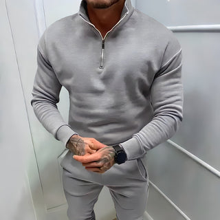 This men's pullover features a half-zip design, crafted from a soft, breathable fabric for a sporty fit. Its elegant and versatile style makes it 3