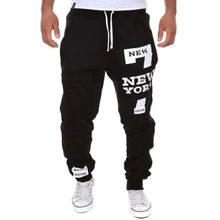 Stylish men's joggers made from soft, breathable fabric, featuring a relaxed fit for comfort. Ideal for casual outings or workouts, these versatile pants combine 4