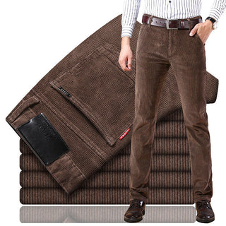 A pair of men's classic-fit trousers made from high-quality fabric, featuring a versatile and elegant design suitable for both formal and casual occasions. 4