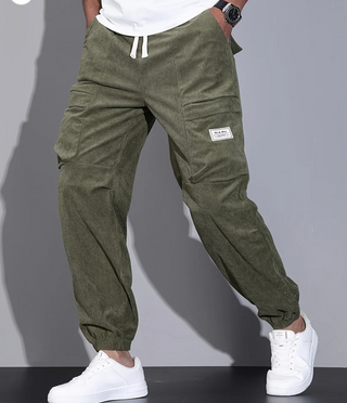 Men's classic trousers made from durable fabric, featuring practical pockets and a versatile design suitable for various occasions, combining comfort with timeless style. 2