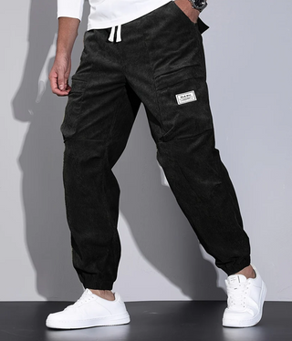 This men's classic design trouser features practical pockets and is made from durable fabric, making it versatile for various occasions. Its timeless style ensures a polished look 3