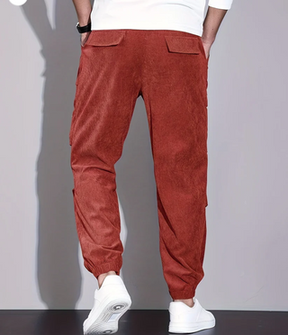 Men's classic design trousers made from durable fabric, featuring practical pockets and a versatile fit suitable for various occasions. 6
