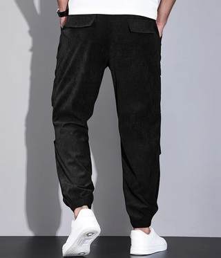 Men's classic design trousers made from durable fabric, featuring practical pockets for convenience. These versatile pants are suitable for various occasions, combining style and functionality effortlessly 7