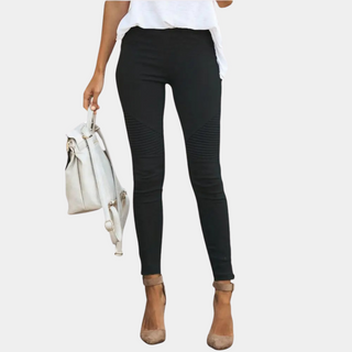 A pair of women's skinny jeggings in black, made from a comfortable stretch fabric that offers a sleek and versatile look, perfect for casual or dressy 0