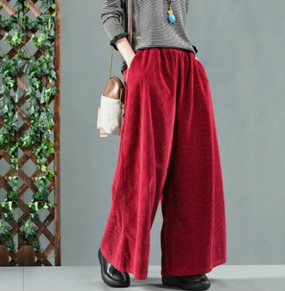 Stylish women's vintage wide-leg trousers made from a soft, breathable fabric, featuring an elegant design that effortlessly combines versatility with a chic, retro aesthetic suitable 0
