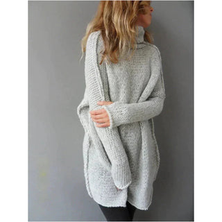 This women's oversized turtleneck sweater is made from a soft, warm fabric, featuring a stylish design perfect for chilly days. Its relaxed fit and cozy 1