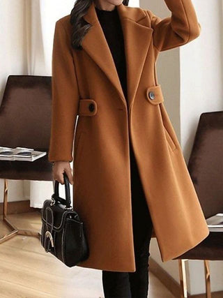 A long, elegant black women's coat made from high-quality wool blend, featuring a timeless design perfect for winter wear, with a tailored silhouette and stylish details 3