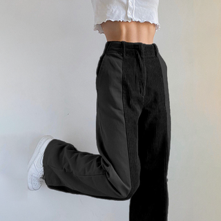 Elegant high-waisted women's trousers with wide legs, made from a soft, breathable fabric. These versatile pants combine comfort with style, perfect for both casual 1